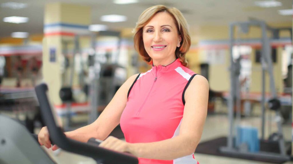 A woman performing a workout routine to stay active and healthy