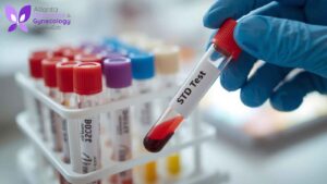 A lab technician handling a test tube with a blood sample labeled 'STD Test'.